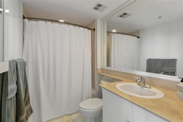 full bathroom featuring toilet, tile patterned flooring, shower / bath combination with curtain, and vanity