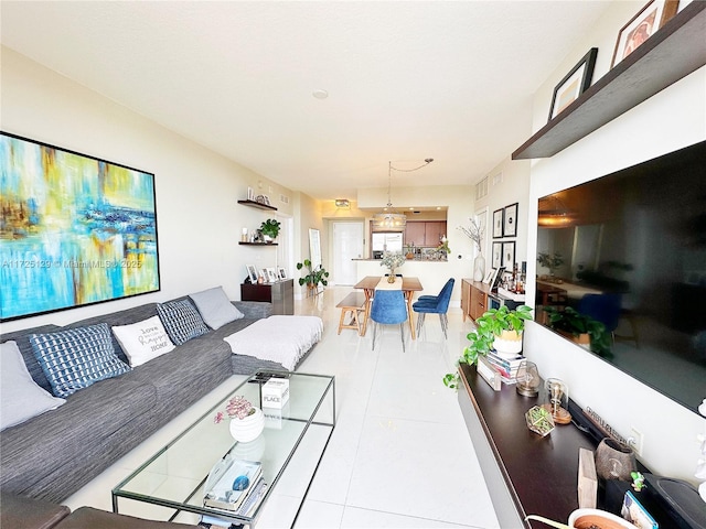 living area with tile patterned flooring