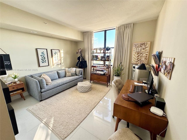 living room with a textured ceiling