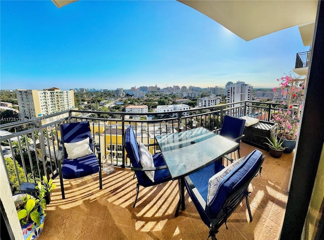 balcony featuring a city view