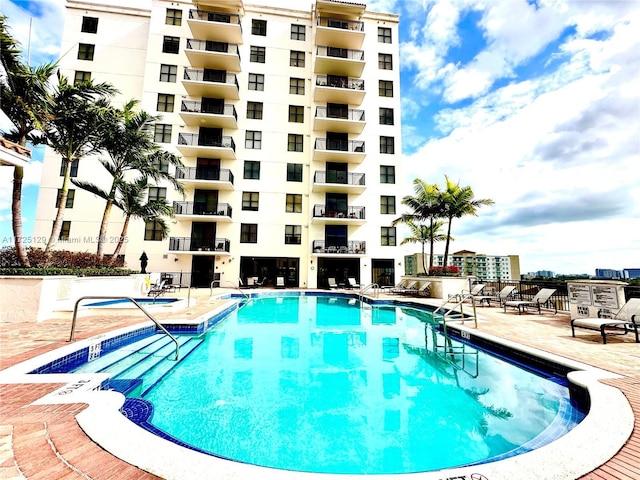 community pool featuring a patio