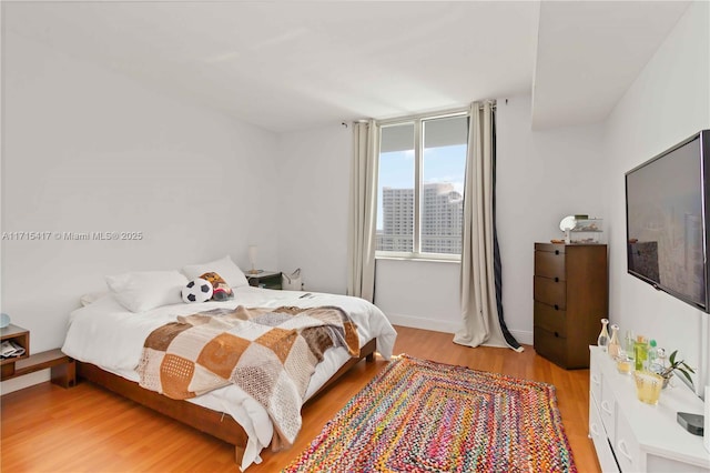 bedroom featuring light hardwood / wood-style flooring