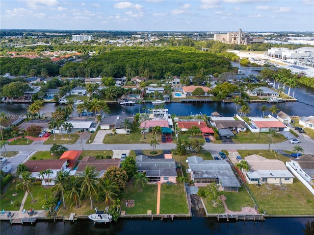 birds eye view of property featuring a water view