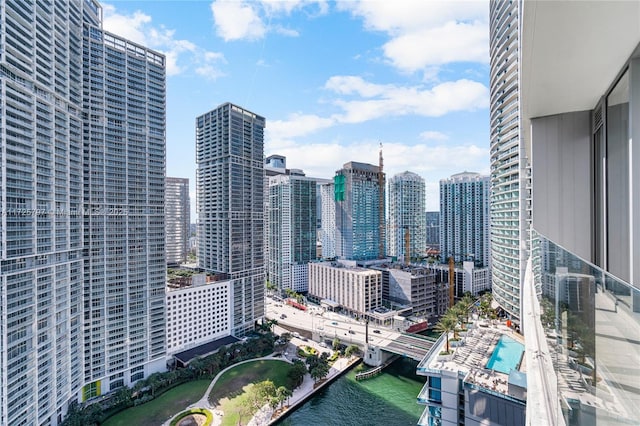 property's view of city featuring a water view