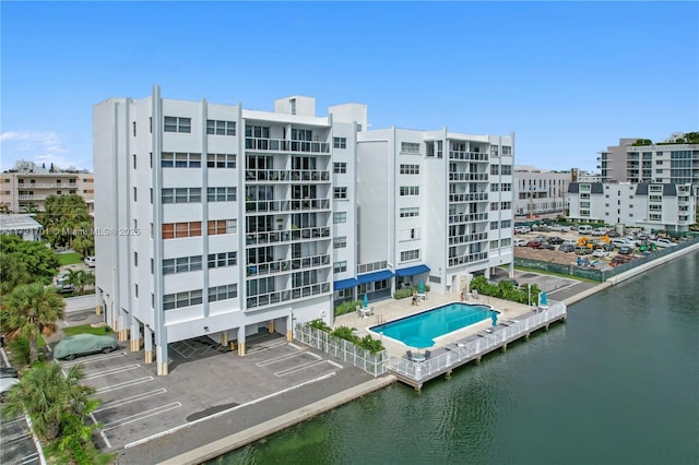 view of building exterior with a water view