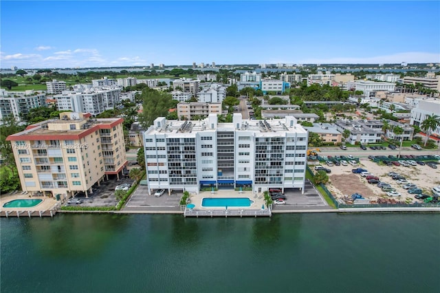 birds eye view of property featuring a water view