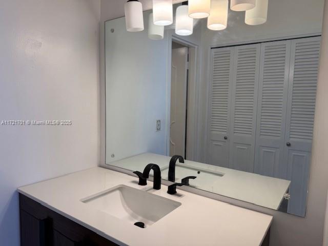 9381 E Bay Harbor Dr Unit 401N, Bay Harbor Islands, FL 33154 - bathroom featuring vanity and a closet
