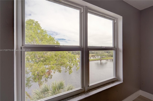 interior details featuring a water view