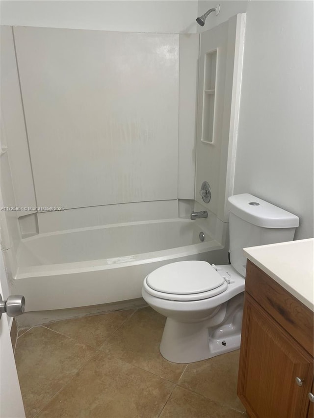 full bathroom with toilet, shower / washtub combination, vanity, and tile patterned flooring