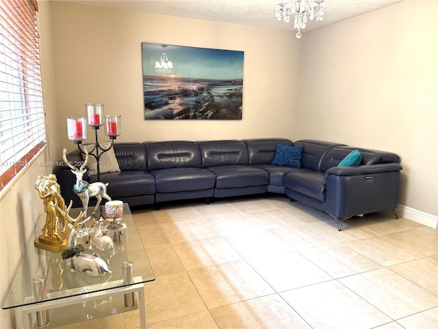 tiled living room featuring a textured ceiling