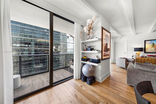 wine cellar featuring beam ceiling and hardwood / wood-style floors