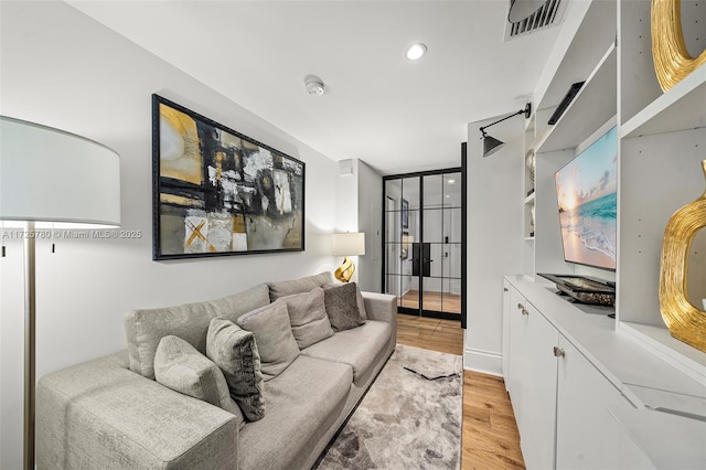 living room featuring light hardwood / wood-style flooring