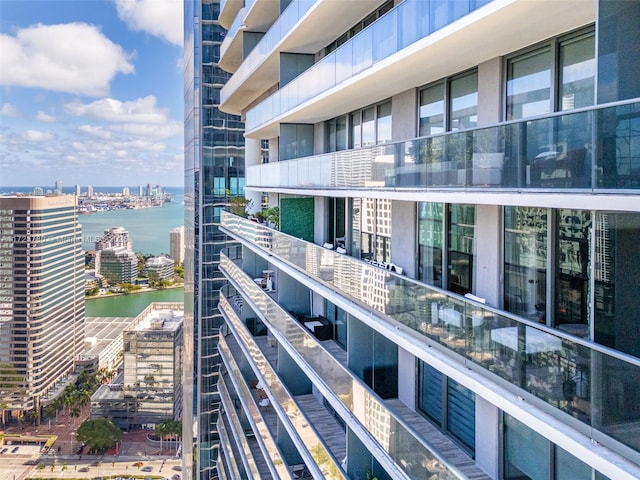 balcony featuring a water view