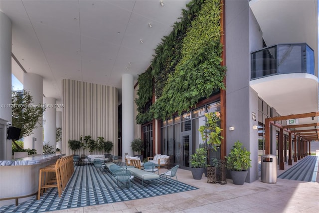 view of patio with an outdoor bar