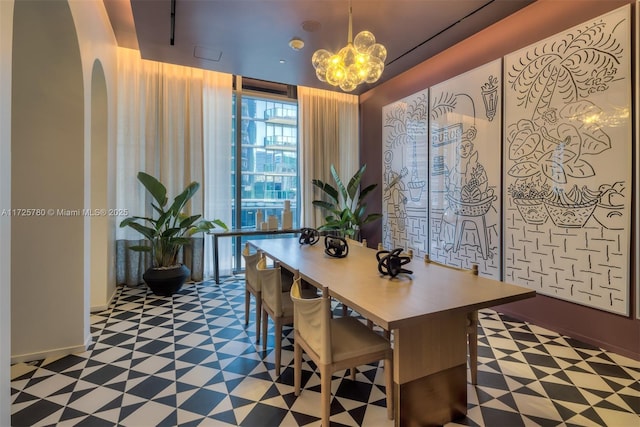 dining area featuring a chandelier