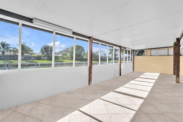 unfurnished sunroom with a healthy amount of sunlight