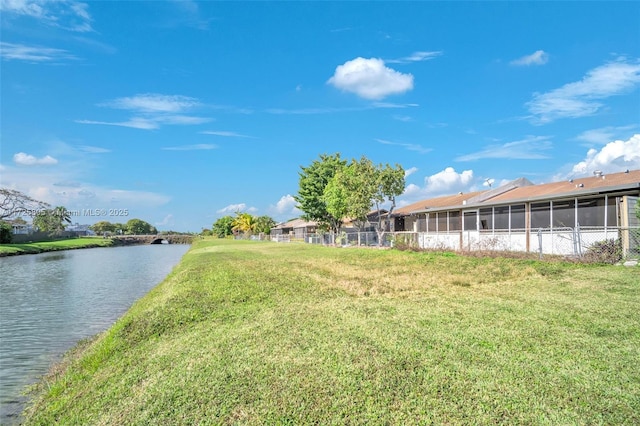 view of yard with a water view