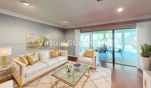 1 E Balfour Rd E, Palm Beach Gardens, FL 33418 - living area with ornamental molding, wood finished floors, and recessed lighting