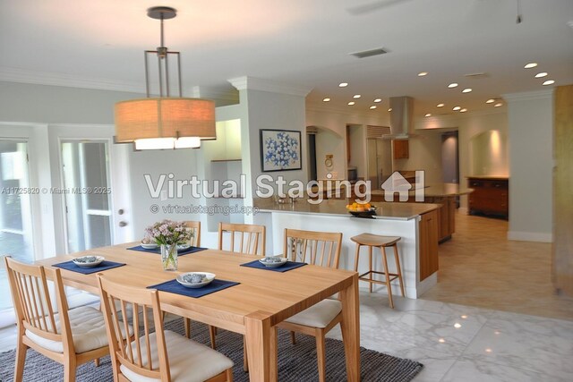 1 E Balfour Rd E, Palm Beach Gardens, FL 33418 - dining room with crown molding and recessed lighting