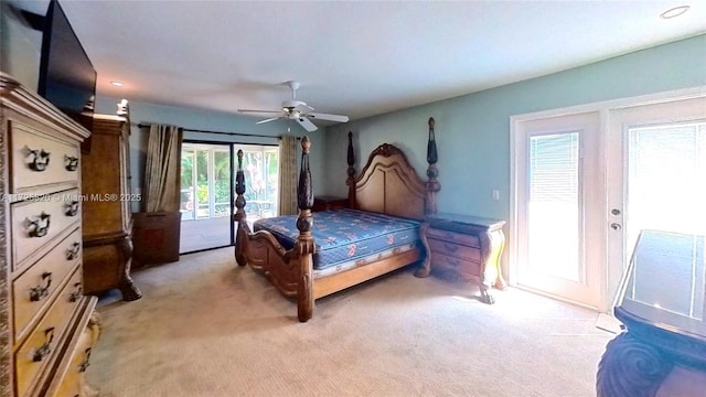 carpeted bedroom featuring ceiling fan, access to exterior, and french doors