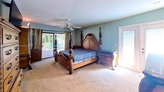 unfurnished bedroom featuring light colored carpet and ceiling fan