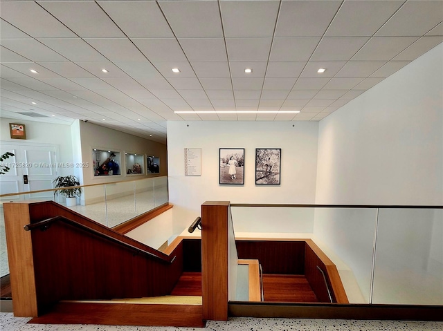 1 E Balfour Rd E, Palm Beach Gardens, FL 33418 - stairs featuring speckled floor and recessed lighting
