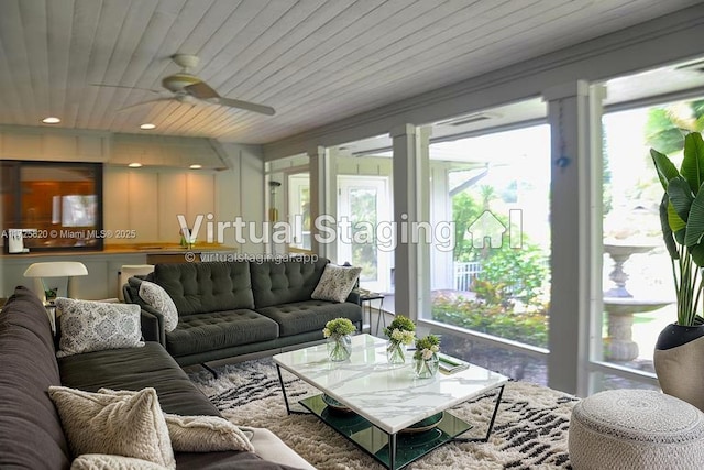 1 E Balfour Rd E, Palm Beach Gardens, FL 33418 - living room featuring healthy amount of natural light and a ceiling fan