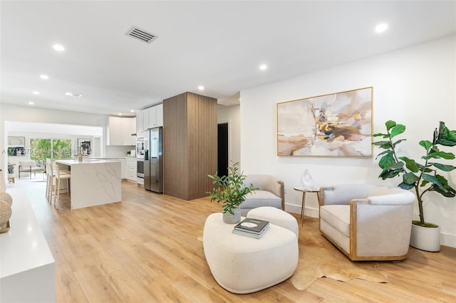 living room featuring light wood-type flooring