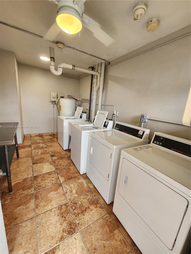 clothes washing area featuring washing machine and dryer