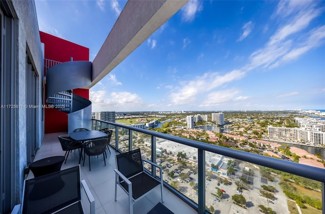 balcony featuring a city view