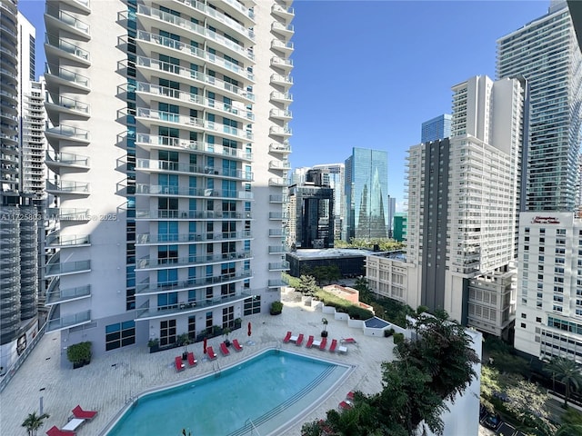 view of pool featuring a city view