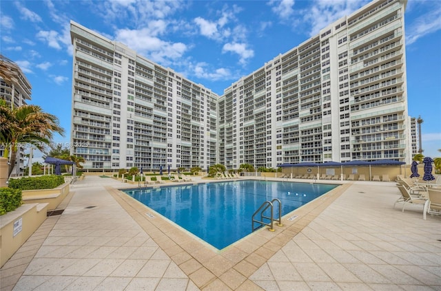 pool featuring a patio area