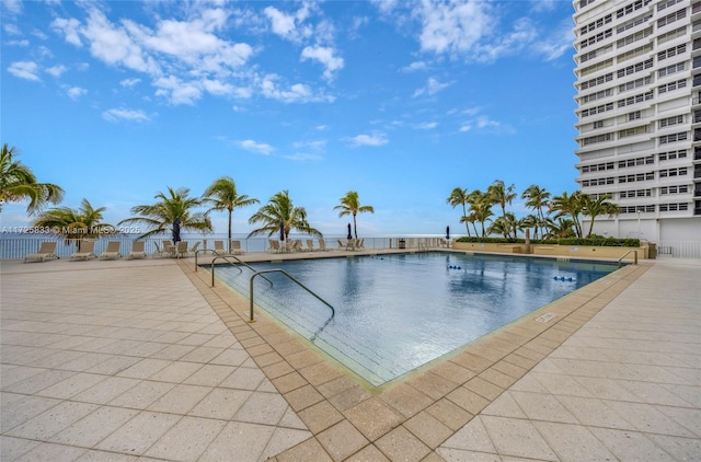 community pool with a patio