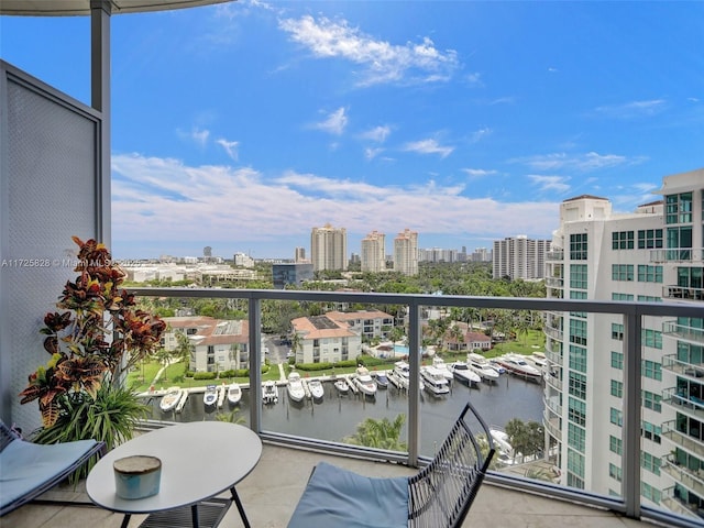 balcony featuring a water view