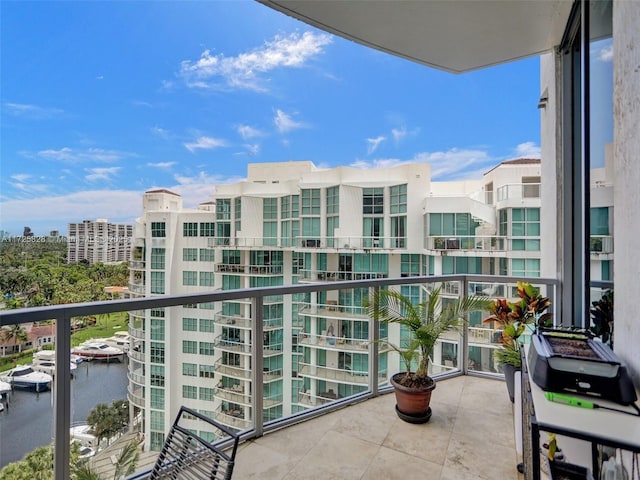 balcony featuring a water view