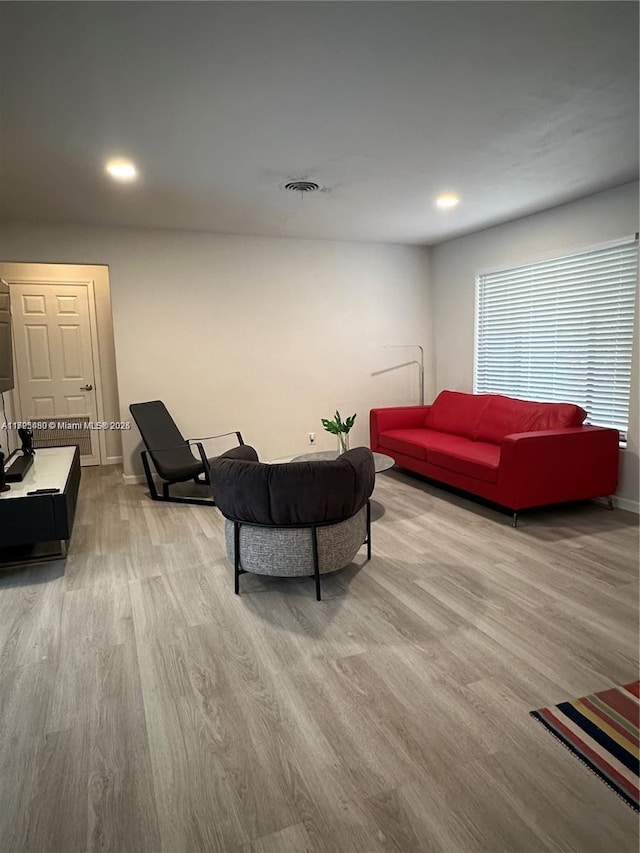 living room featuring light hardwood / wood-style floors