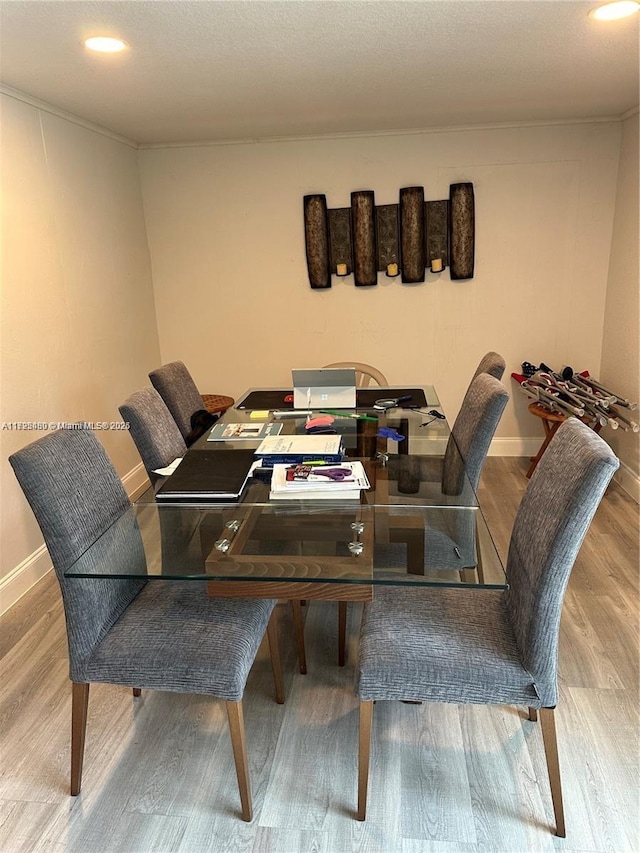 dining room with light hardwood / wood-style flooring