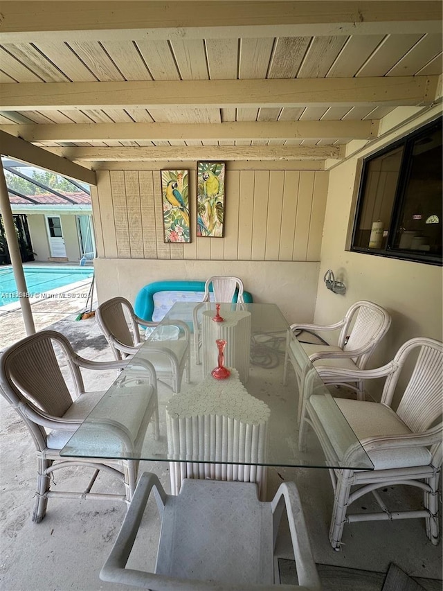 view of patio / terrace featuring an indoor pool