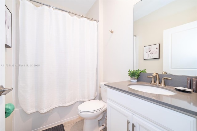 full bathroom featuring shower / tub combo, tile patterned flooring, vanity, and toilet