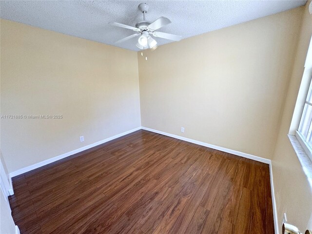 full bathroom with toilet, hardwood / wood-style flooring, a textured ceiling, shower / bathtub combination, and vanity