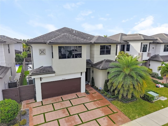 view of front of property with a garage