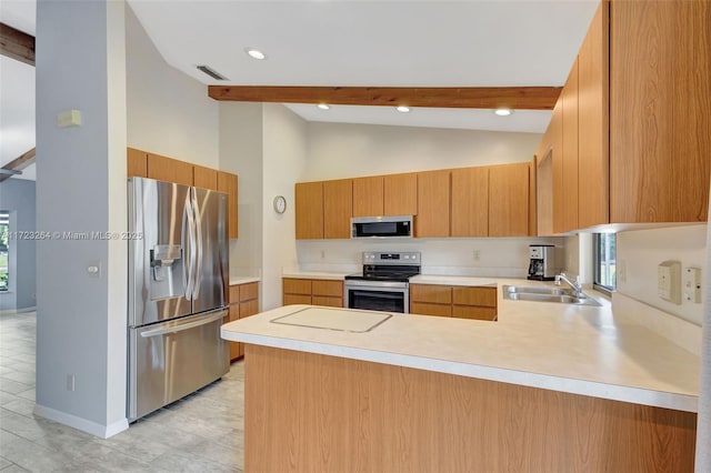 kitchen featuring kitchen peninsula, high vaulted ceiling, appliances with stainless steel finishes, light tile patterned flooring, and sink