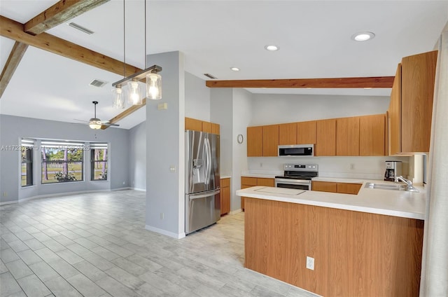 kitchen featuring stainless steel appliances, sink, beamed ceiling, ceiling fan, and kitchen peninsula