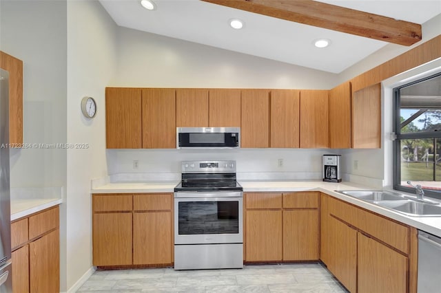 kitchen with stainless steel appliances, vaulted ceiling with beams, and sink