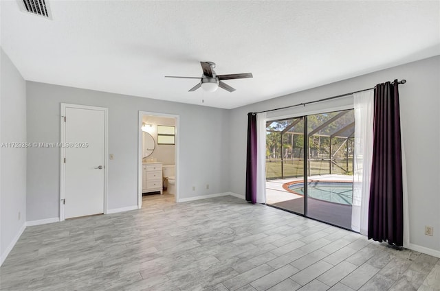 spare room with ceiling fan