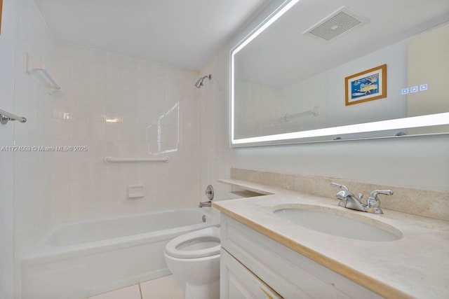 full bathroom with tiled shower / bath, tile patterned flooring, vanity, and toilet