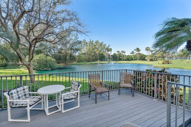 wooden terrace with a water view