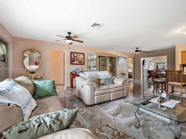 living room with ceiling fan