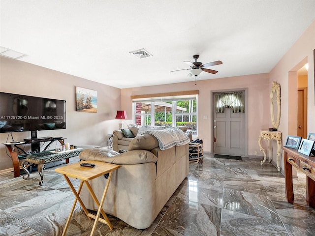 living room featuring ceiling fan