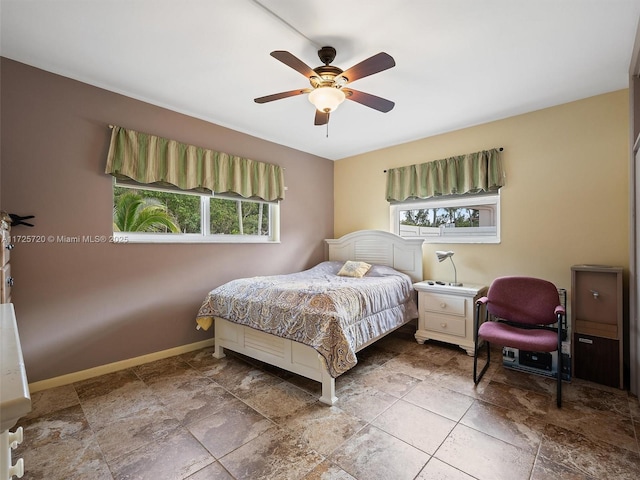 bedroom featuring ceiling fan